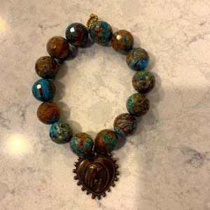 Powerbeads bracelet with Blessed Mother medallion